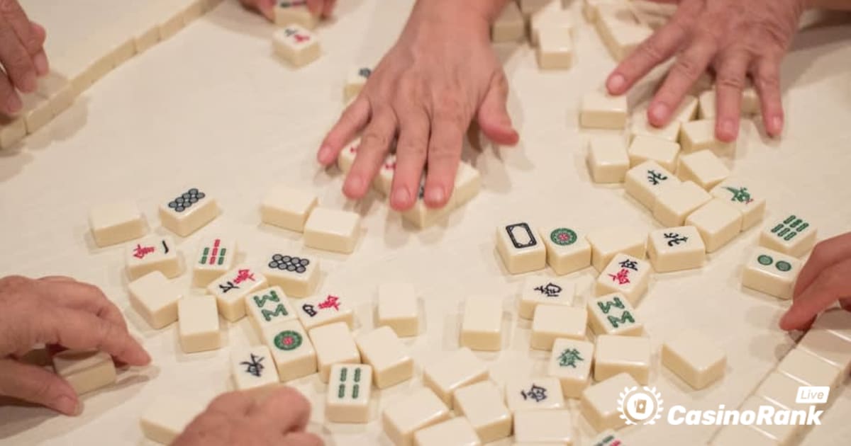 Mahjong හි කෙටි ඉතිහාසය සහ එය වාදනය කරන්නේ කෙසේද